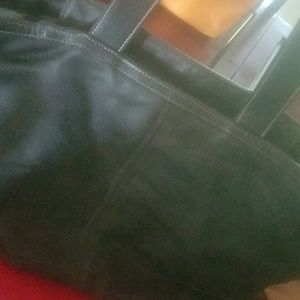 Vinyl COACH tote, black with baby blue accents.